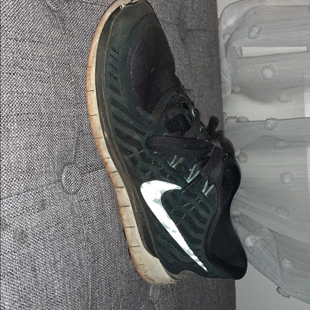 Worn Nike sneakers woman’s
